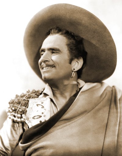 Portrait of Douglas Fairbanks Sr. filming The Private Life of Don Juan, 1934 by American Photographer